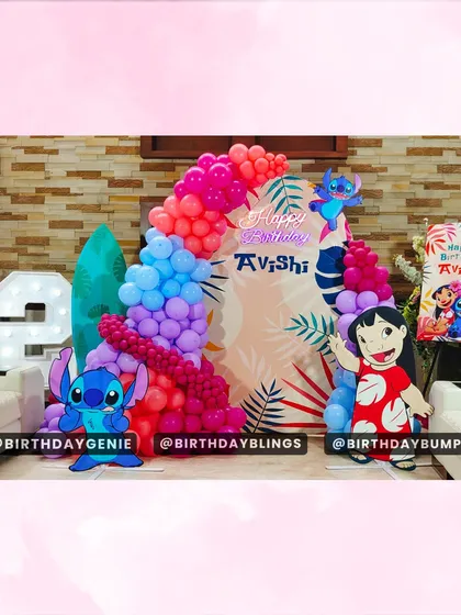 A lively Lilo & Stitch party for a 12th birthday, set up in a living room. This shows how I can transform any space with a custom backdrop, light-up numbers, and colorful balloons.