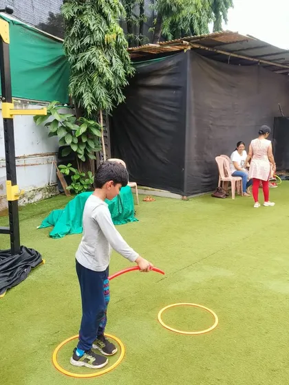 This ring toss game requires a steady hand and good aim. It's a calmer activity that we use to work on fine motor skills and focus. Each successful toss is a little victory that builds confidence.