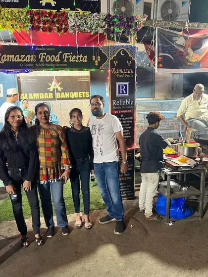 A family enjoying the live cooking at our tawa station.