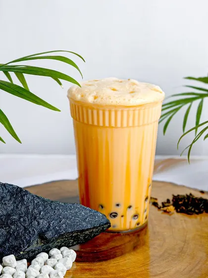 Indulge in the creamy delight of my authentic Thai Milk Boba Tea. It has a unique, rich flavor that will transport you straight to the streets of Thailand. A must-try for any tea enthusiast.