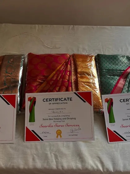 I am proud to share the results of my offline workshops. Here are certificates of appreciation for students who learned my saree box folding and draping techniques, alongside their perfectly folded sarees.