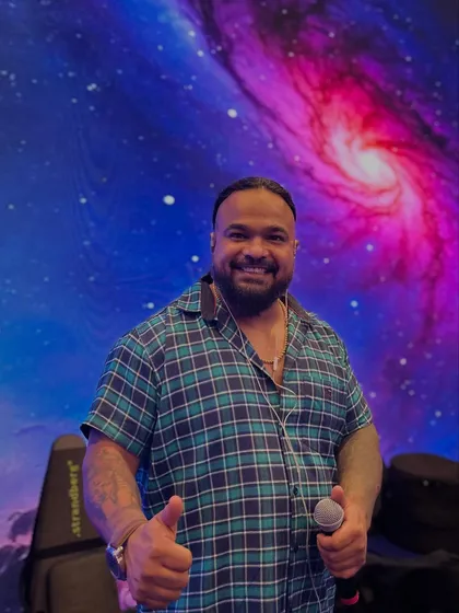 Thumbs up from the frontman before hitting the stage for Godrej Properties in Pune. The cosmic-themed LED screen set a cool, futuristic vibe for the event.