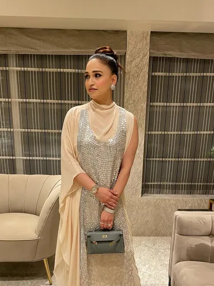 A classic top knot is always a good idea. I created this elegant and polished updo for Sherry Anand, which is perfect for any formal occasion. It’s a timeless hairstyle that is all about clean lines and sophistication.