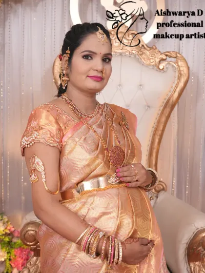Celebrating a special Seemantha (baby shower) with this radiant mom-to-be. I created a traditional look with glowing skin, defined eyes, and a bright pink lip to match her beautiful tissue silk saree.