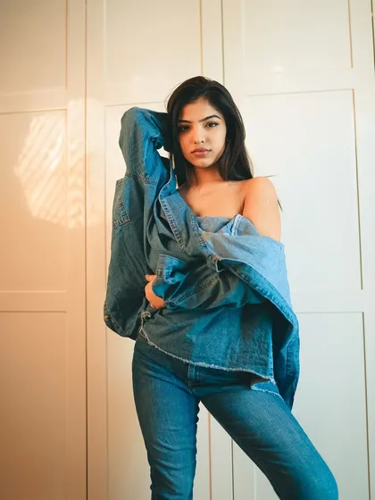 A more covered-up but still edgy look from the same series. The way the denim is draped creates interesting shapes and shadows.