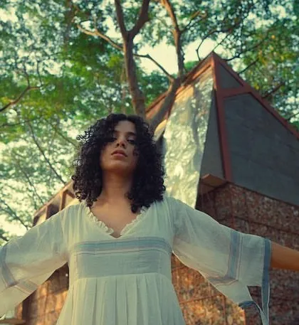 An ethereal shot of a dancer from the "Made to Move" music video, with makeup designed to look natural and free-spirited.
