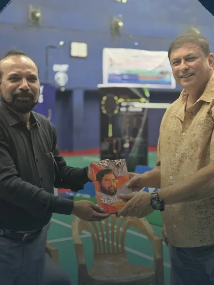 Dr. Prof. Pradeep Dhawal being honored at the event. My network extends to the education sector, bringing a holistic perspective to my sports events.