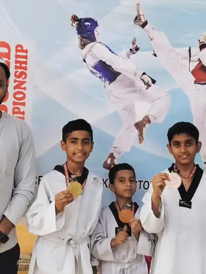 Posing with our champions from the Warriors Taekwondo Championship. We are proud of every single student.