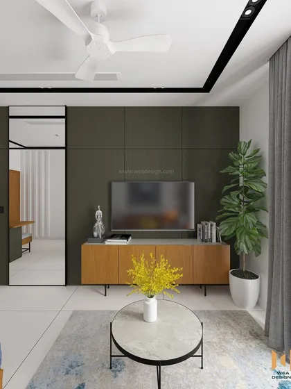 An introduction to our "Nano Homes" concept for compact living. This 450 sq ft 1BHK in Electronic City features a modern design with a dark green accent wall and a mirrored pivot door to the bedroom.