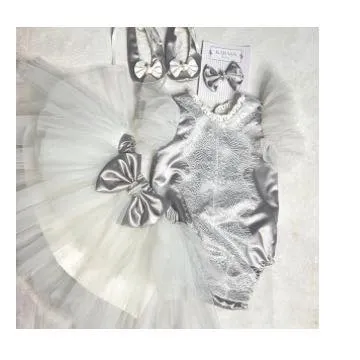A flat-lay of our silver newborn romper set. The tulle tutu adds a touch of princess magic, making it perfect for a first photoshoot.