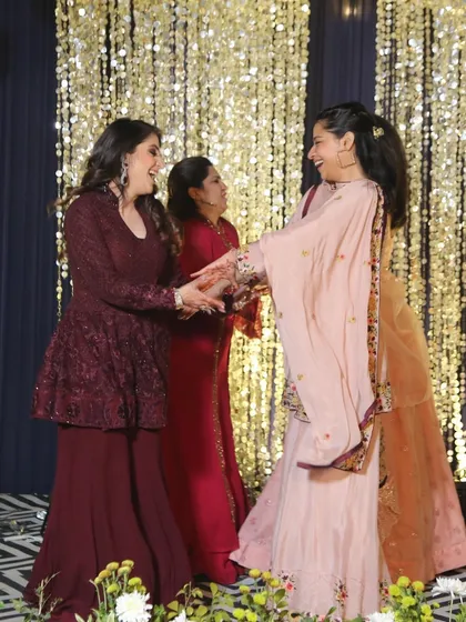 The bride's tribe, a mix of sisters and cousins, having a blast during their performance.