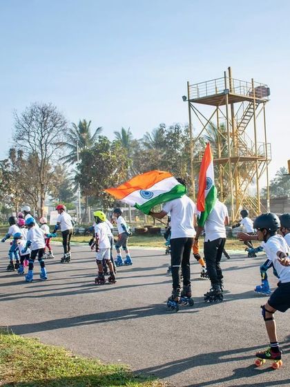 A ground-level view of the Skate Marathon, with young participants proudly carrying the Indian flag. We love hosting events that inspire the next generation.
