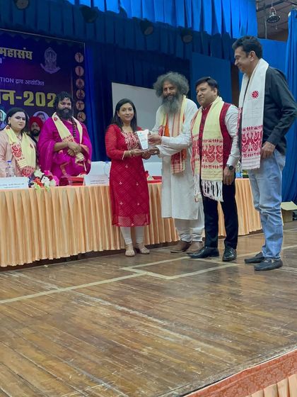 Our founder, Dr. Bharti, receiving an award for her contributions to yoga and wellness. We are grateful for the recognition of our hard work and dedication.