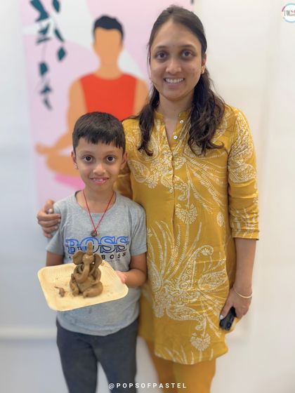 Another happy mother and son pair with their finished artwork from our Ganesha-making session. These are the moments we live for.