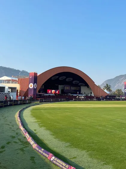 A wide view of the Sri Sathya Sai National Cricket League, where we transformed a world-class cricket ground into a venue for a grand celebration of sportsmanship. Our work included the main stage, branding, and audience infrastructure.