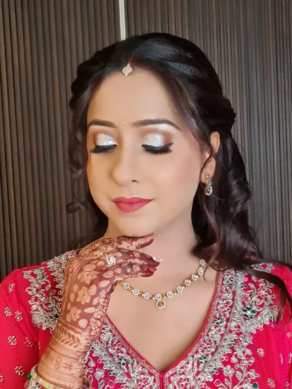 A close-up of Diksha's stunning party makeup. The silver glitter eyeshadow is the star of the show.