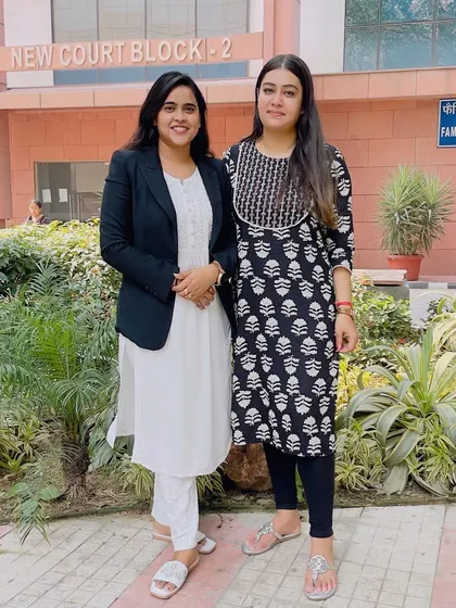 With a colleague outside the Family Court. Teamwork is essential in building a strong case.