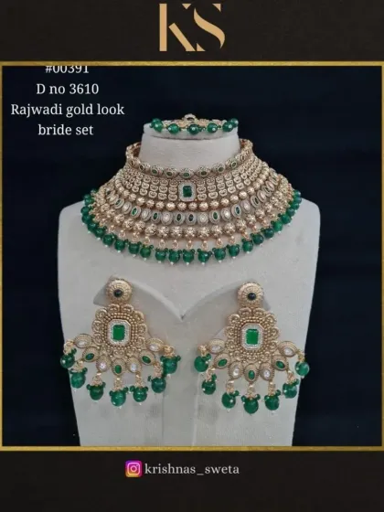 An exclusive Rajwadi gold-look bridal set with emerald green beads. This premium set includes a choker, matching earrings, and a maang tikka for a complete and regal look.