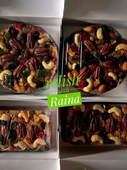 A look at my Christmas fruit cakes before they are boxed. You can see how they are loaded with a variety of nuts and candied fruits like pecans and cashews.