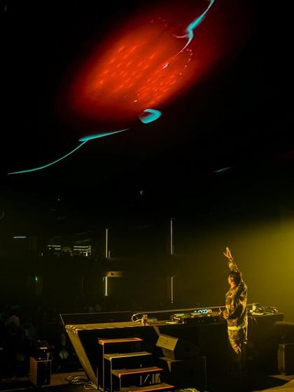 Another perspective of the stage at Quake, highlighting the unique architecture and lighting design.