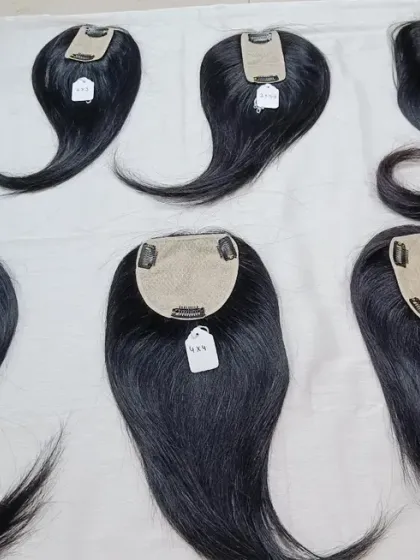 A top-down view of my hair topper collection. From smaller pieces for minimal coverage to larger ones for more significant volume, there is a size for everyone.