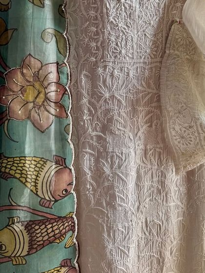 A detail shot of the sleeve and the Kalamkari dupatta, showing how the two elements complement each other.