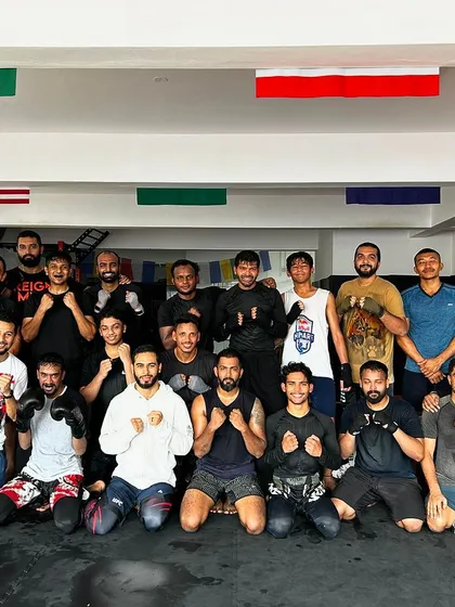 The crew after a psyched sparring session. The intensity on the mats builds strong bonds.