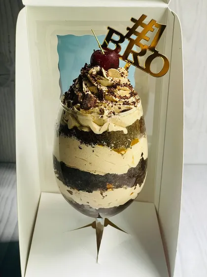 My Mocha Mirage Delight, created specially for Rakhi. It's an elegant dessert glass layered with chocolate cake, coffee mousse, almond praline, caramel, and chocolate chunks.