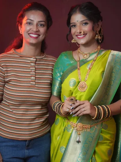 One of my students with her model, who is styled in a beautiful green Maharashtrian saree. I love seeing their skills come to life.