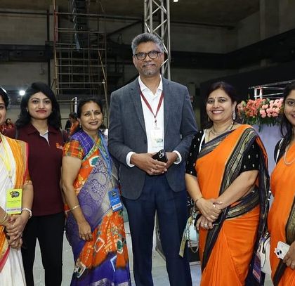 Here I am with my fellow teachers and the founder of SIP Abacus at a competition event. We work as a team to ensure our students get the best guidance and support.