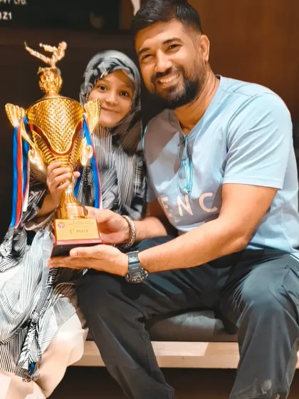 A close-up of the impressive trophy won at the Open State Taekwondo Championship. This represents the pinnacle of achievement for our young athletes.