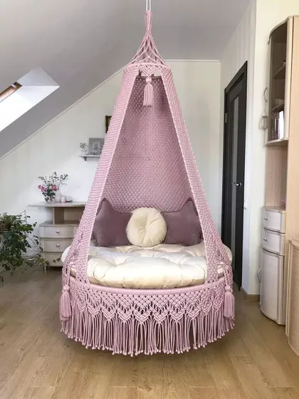 A baby pink swing that adds a soft and fragrant touch to your home. It's a comfortable and stylish piece that fits within your budget.