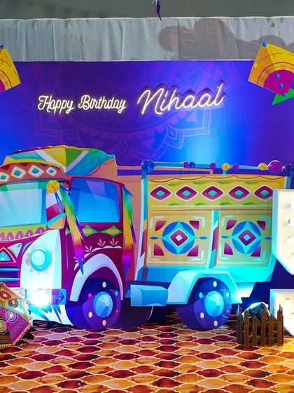 We love bringing unique and vibrant ideas to life. This custom Punjab-themed birthday stage, featuring a colorful truck, traditional elements, and personalized lighting, shows our ability to create a truly one-of-a-kind celebration.