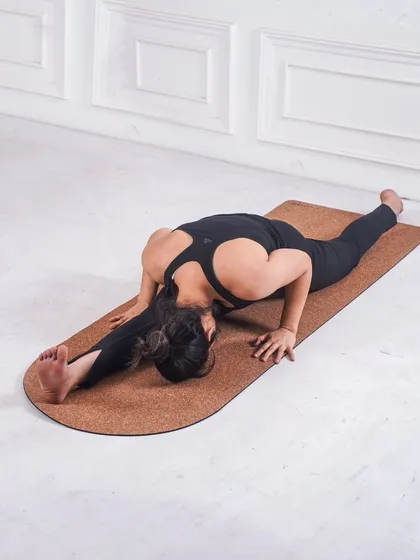 Full Hanumanasana (Front Splits). This pose was a humbling journey for me, teaching me patience and the importance of listening to my body. It's a beautiful expression of devotion and opening.