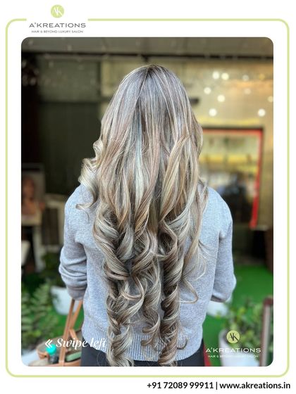 The beauty of expertly blended highlights. This cool-toned blonde and ash brown combination creates a sophisticated look with stunning dimension.