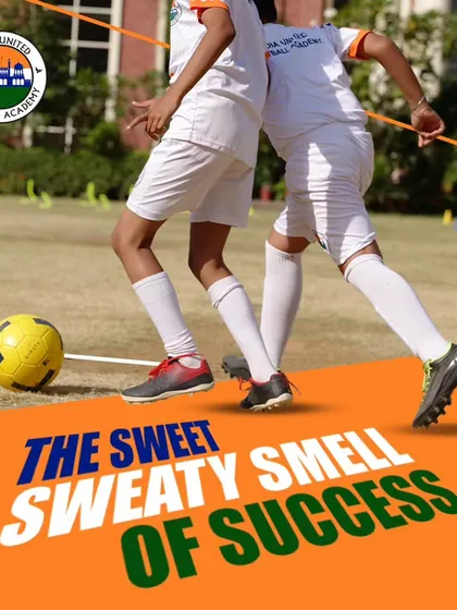 The sweet, sweaty smell of success. Two players challenge for the ball in a competitive drill, showing the hard work required to win.
