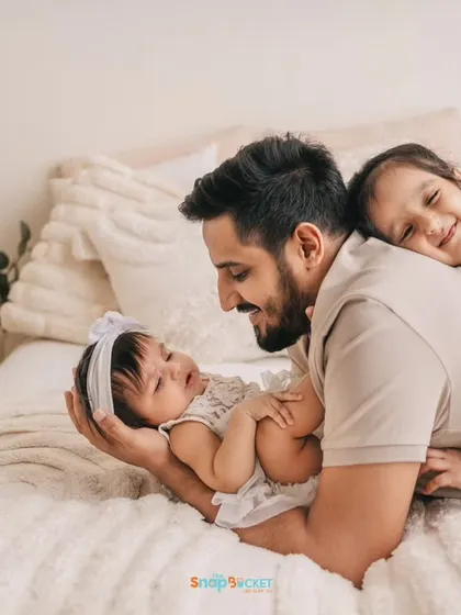 Capturing the bond between a father and his daughters is pure magic. These lifestyle sessions are perfect for showing the natural, playful interactions that make your family unique.