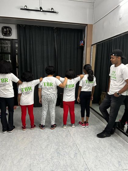 A moment with our young dancers. We believe in building a strong bond with our students, creating a family-like atmosphere in the studio.