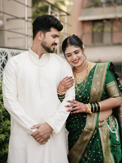 The bride resting her head on her partner's shoulder speaks volumes. It's a simple, elegant pose that conveys trust, comfort, and deep affection.