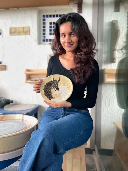 Look at this incredible Sgraffito plate a student made! It’s amazing to see people who've never touched clay before create such detailed, personal art. You can do this too.