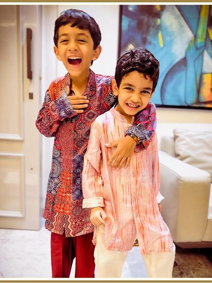 Brotherly love and festive cheer. These two brothers are celebrating in style with our elegant and comfortable printed kurtas.