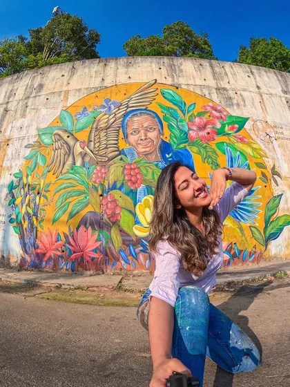 This is my Shakti. Pouring my heart into this mural in Coorg, titled 'My Kodavathi Beauty', was a spiritual experience. It’s a tribute to the local women who work in the coffee estates, capturing their strength and the vibrant nature that surrounds them. This is the kind of storytelling I love to bring to public spaces.