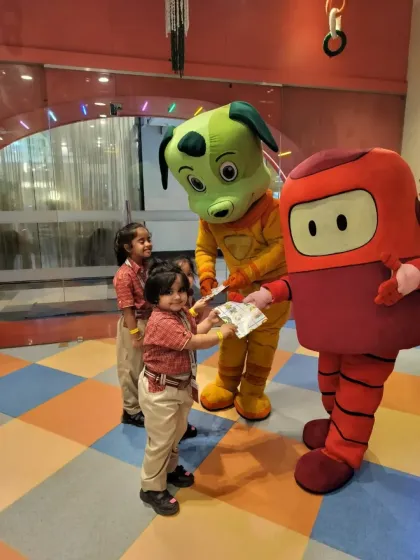 Our mascots, Tinga Dojo and Popsy, love interacting with visiting students, offering high-fives and posing for pictures to make their day extra special.