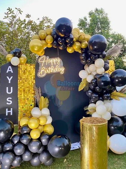 A detailed shot of the modern and chic 21st birthday balloon decor.