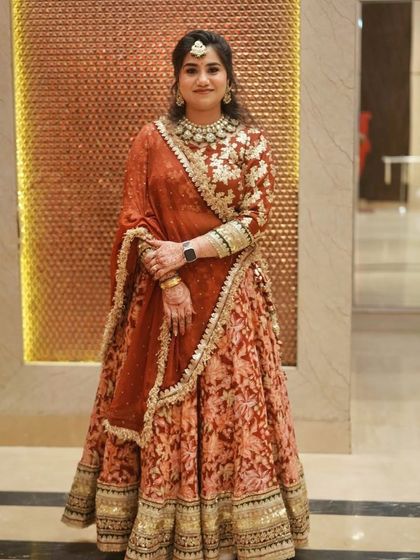 A full-length shot showing her complete look.