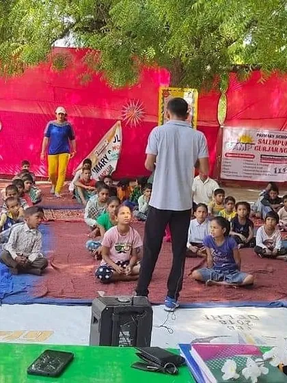 Instructing children on the basics of martial arts during an outdoor summer camp. We teach them discipline and focus from the very beginning.