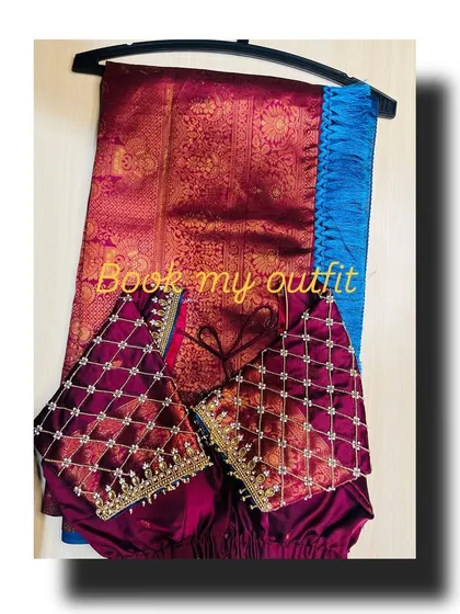 For this blouse, I used a deep maroon velvet and created a quilted effect with precise stitching and beadwork. This technique adds texture and a modern touch to a traditional blouse, making it a versatile piece for different sarees.