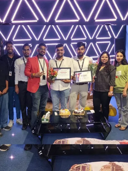 The team celebrating together. These group photos capture the collaborative and supportive spirit that defines our work environment at Auxible India.