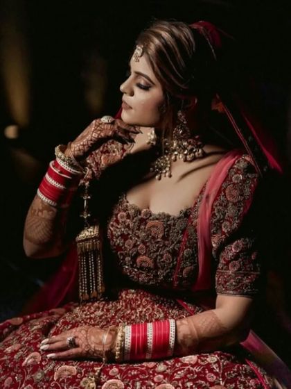 Another artistic shot of the bride. The makeup, with its flawless base and defined eyes, ensures she looks perfect from every angle.