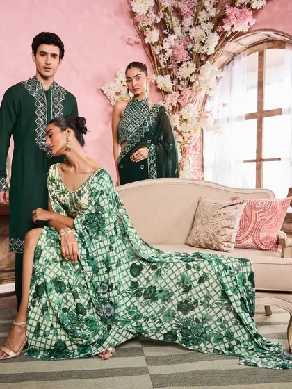 This group shot showcases a variety of green-toned festive outfits. The makeup for all models is kept fresh and radiant to complement the elegant, nature-inspired color palette.